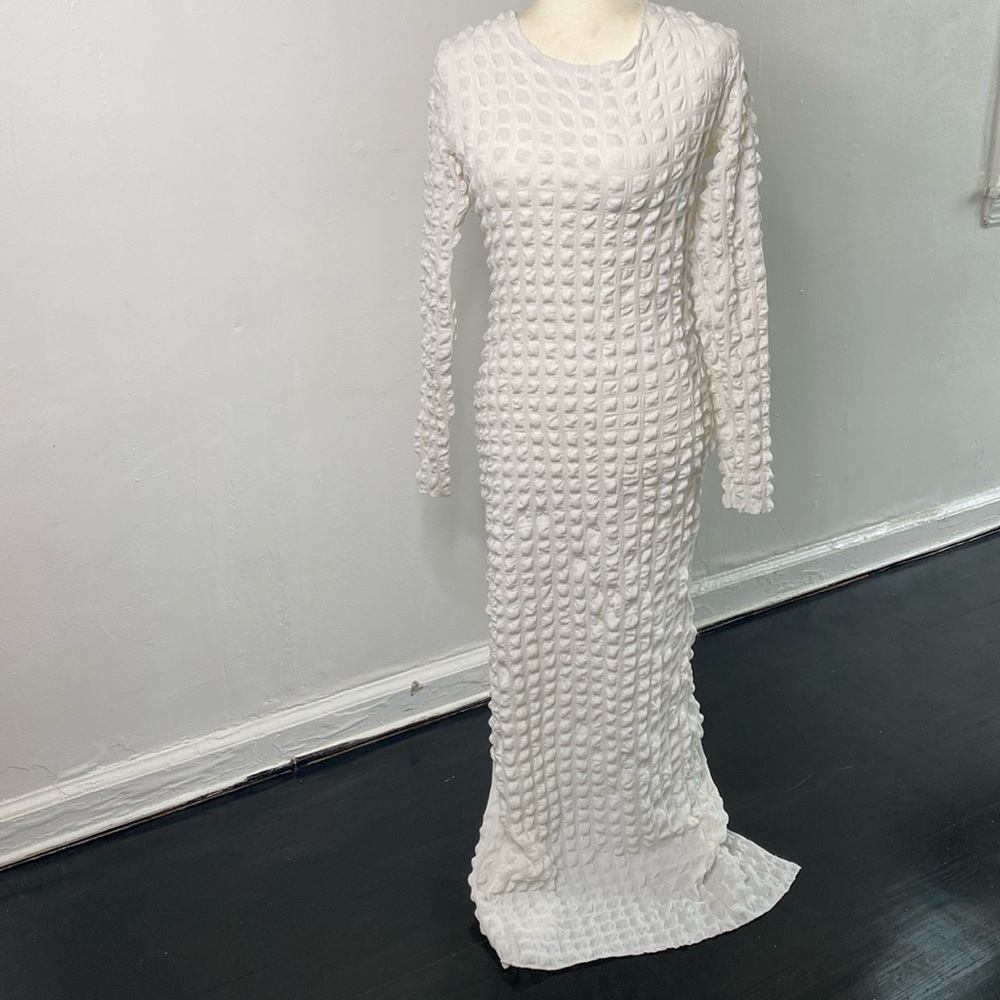 Sexy white stretchy, long sleeve dress with a split in the back